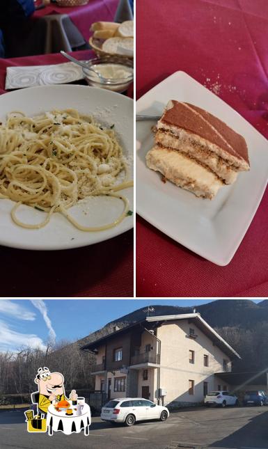 Pizzeria Trattoria Bar Cacciatori si caratterizza per la cibo e esterno