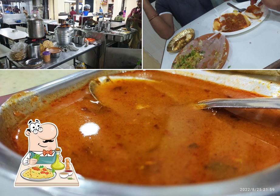 Take a look at the image showing food and interior at Nityanand Pav Bhaji
