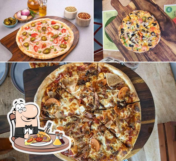Try out pizza at 1441 Pizzeria Surat
