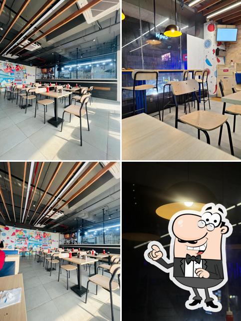 The interior of Domino's Pizza Benachity, Durgapur The interior of Domino's Pizza Benachity, Durgapur