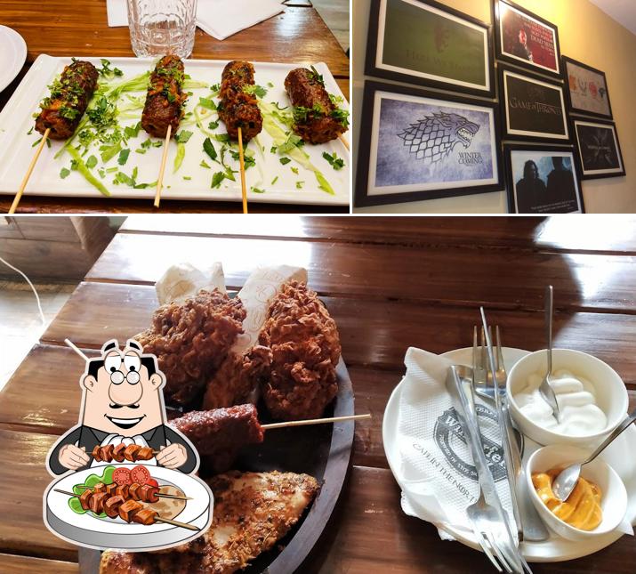 This is the picture depicting food and blackboard at Winterfell Café