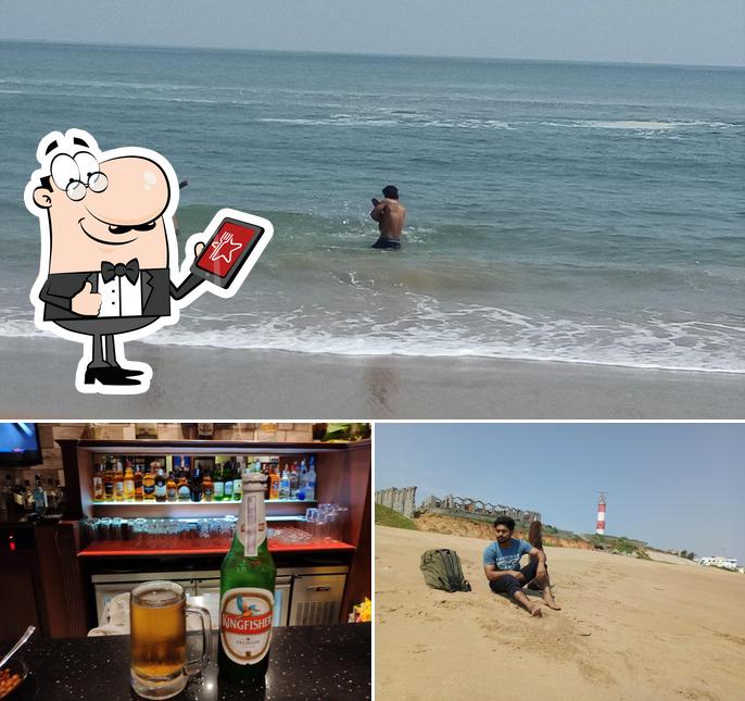 Check out the picture depicting exterior and beer at Light House Bar