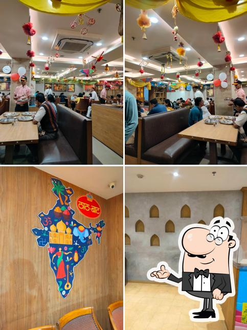 Take a seat at one of the tables at Haldiram's Thaat Baat Restaurant