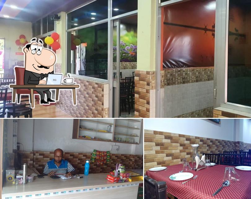 Take a seat at one of the tables at SHAHI FAMILY DHABA