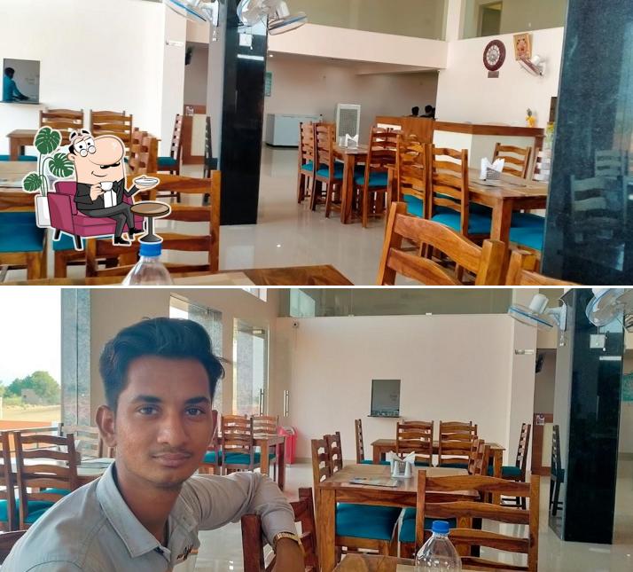 Take a seat at one of the tables at Hotel Highway point