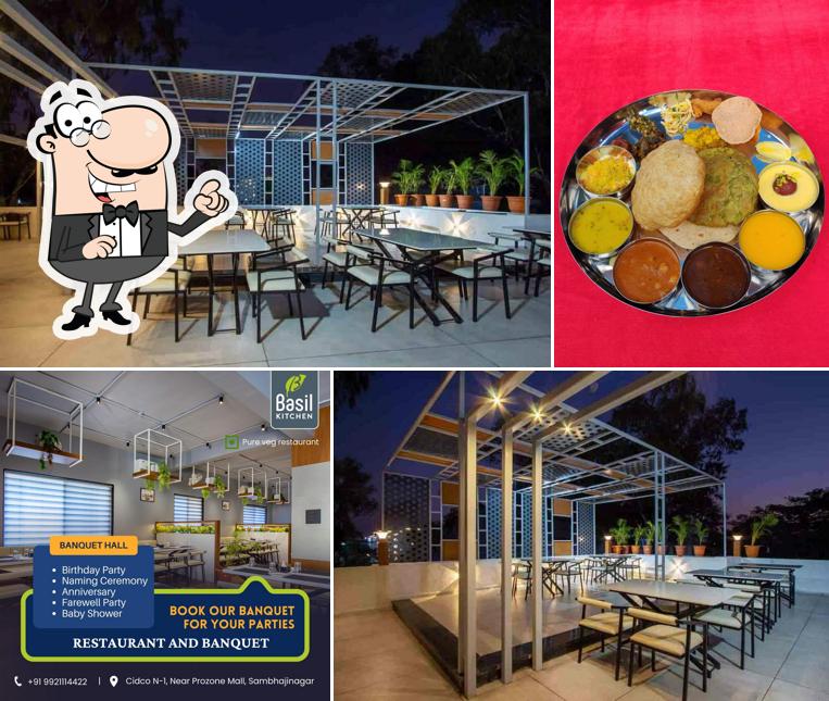 Take a seat at one of the tables at Basil Kitchen Veg Restaurant