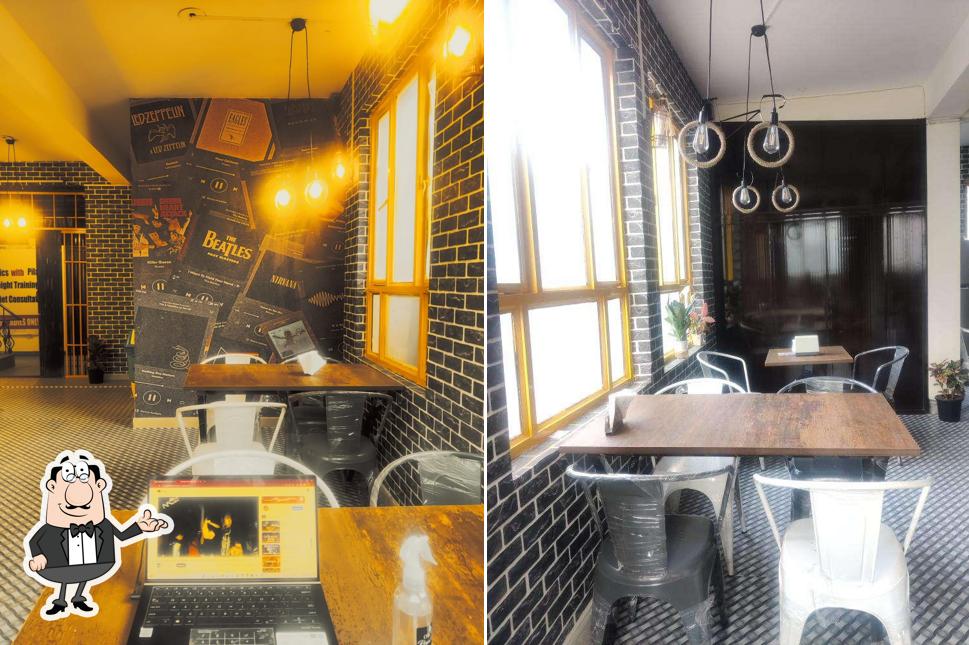 Take a seat at one of the tables at Cafe 1229