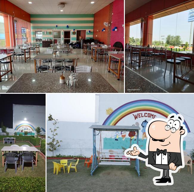 Take a seat at one of the tables at The SUNRISE Garden & Family restaurant