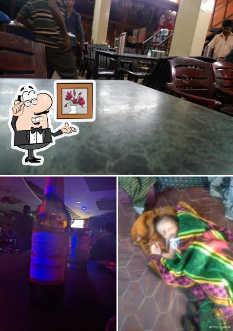 Check out the photo showing interior and beverage at Kamakhya Restaurant