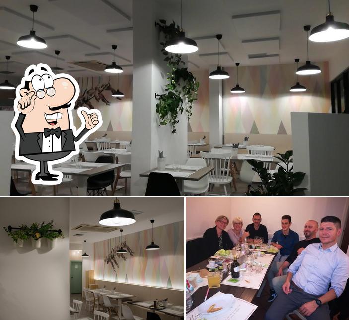 Dai un'occhiata agli interni di Olivia Pizza & Dintorni