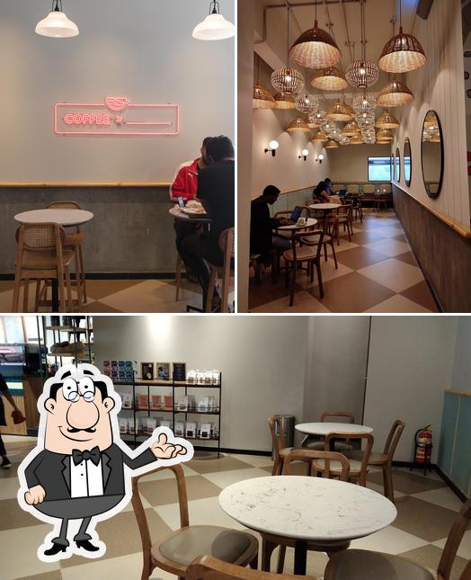 Take a seat at one of the tables at Third Wave Coffee