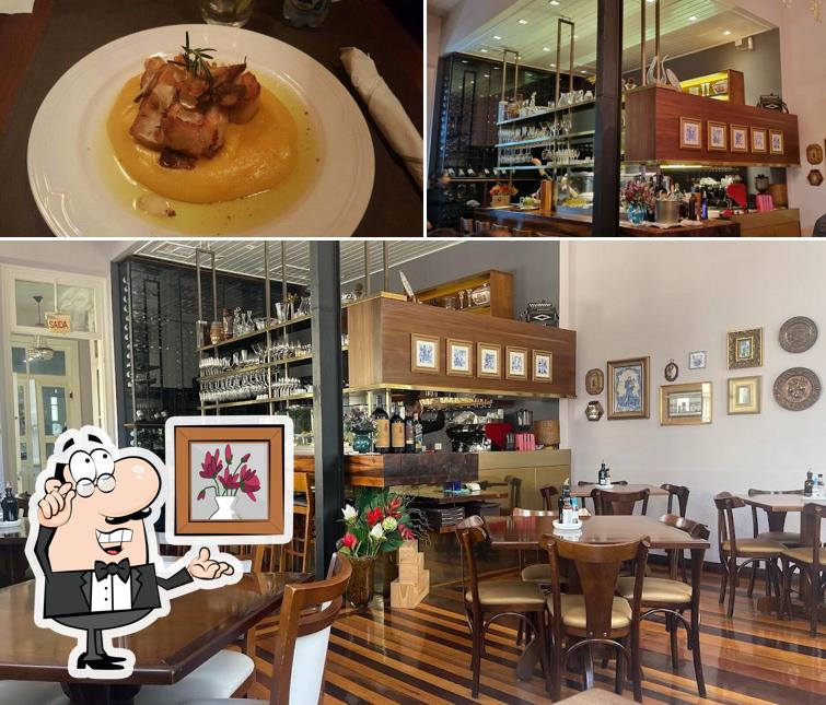 Entre diferentes coisas, interior e comida podem ser encontrados no Delícias Portuguesas