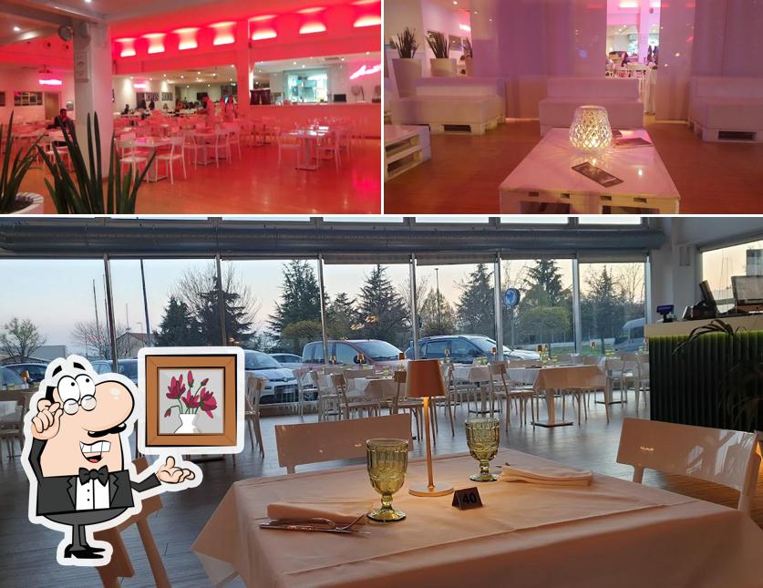 Dai un'occhiata agli interni di Lentini's Pizza & Restaurant Grill