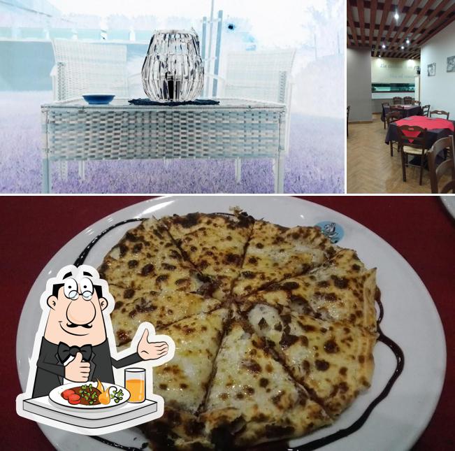 Dai un’occhiata alla foto che raffigura la cibo e interni di L'Incontro dei Sapori