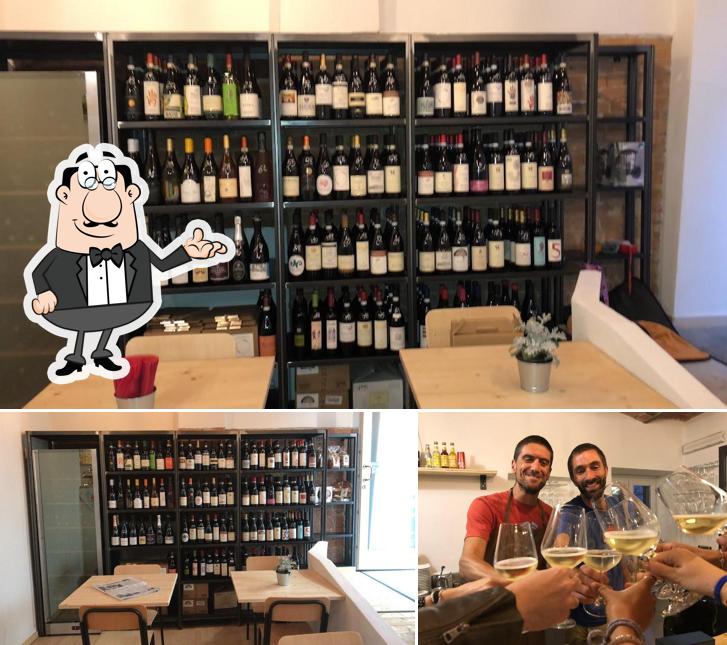 Questa è la immagine che raffigura la interni e bevanda di Vineria Sociale
