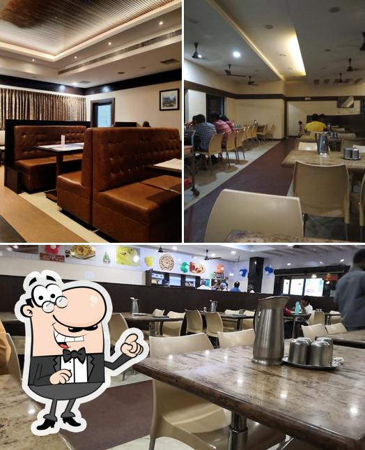 Take a seat at one of the tables at Akshaya Bhavan