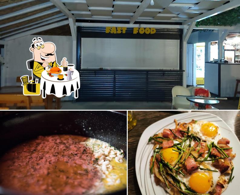 Tra le diverse cose da Fast Food Amigo si possono trovare la cibo e interni