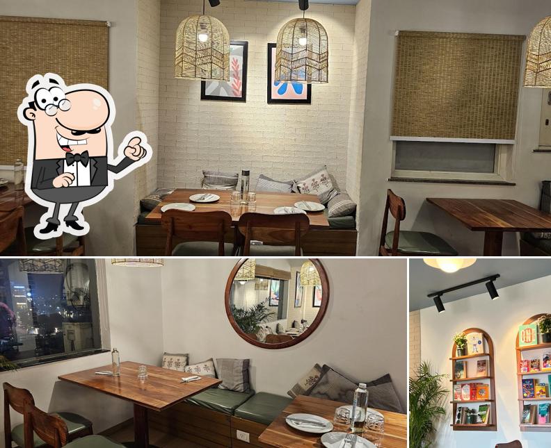 Take a seat at one of the tables at Jamie Oliver Kitchen Cafe