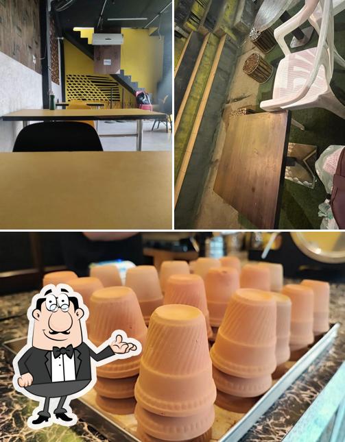 Take a seat at one of the tables at Chai Booze