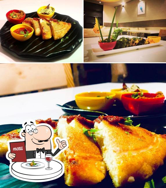 The picture of food and interior at Ruchi Shuchi Koppal