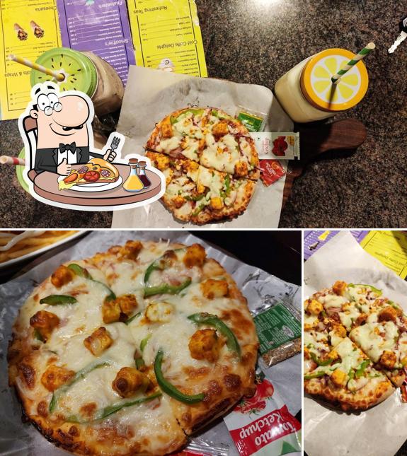 Pick pizza at Maddy's Katti Cafe Veg