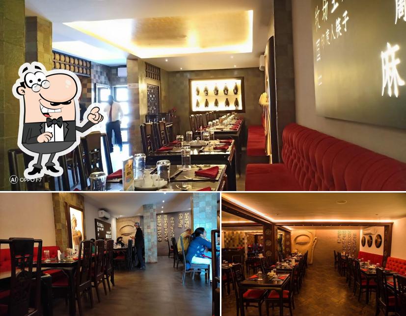 Take a seat at one of the tables at Chowman (sobepur)