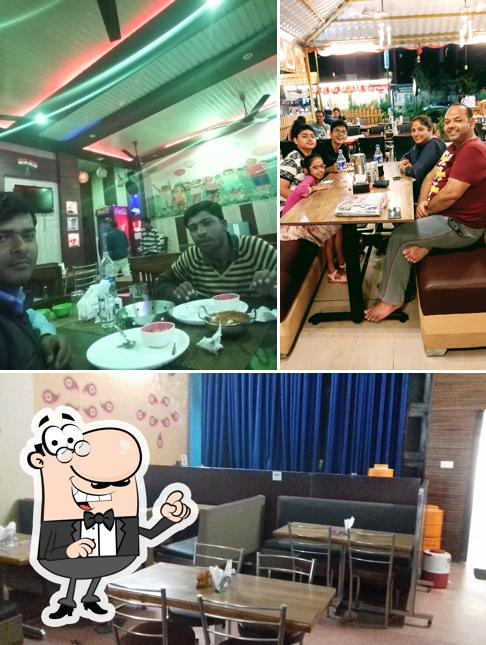 Take a seat at one of the tables at Desi Hut