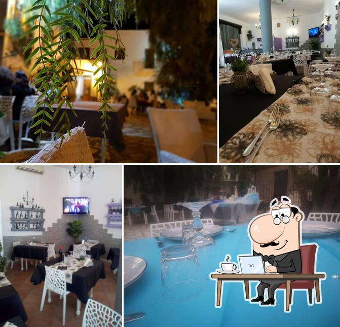 Siediti a un tavolo di IL CORTILE HOTEL & RESTAURANT