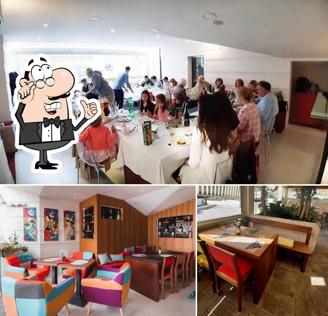 Siediti a un tavolo di Merlin Bistro