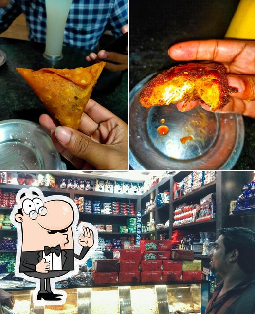 Look at the photo of CHIKKU BAKERY