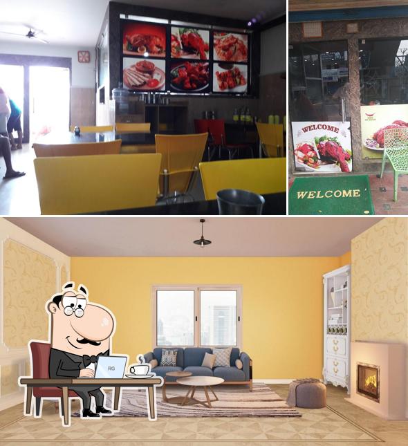 Take a seat at one of the tables at Kalam Hot Kitchen A/c, Mudichur Tambaram Corporation