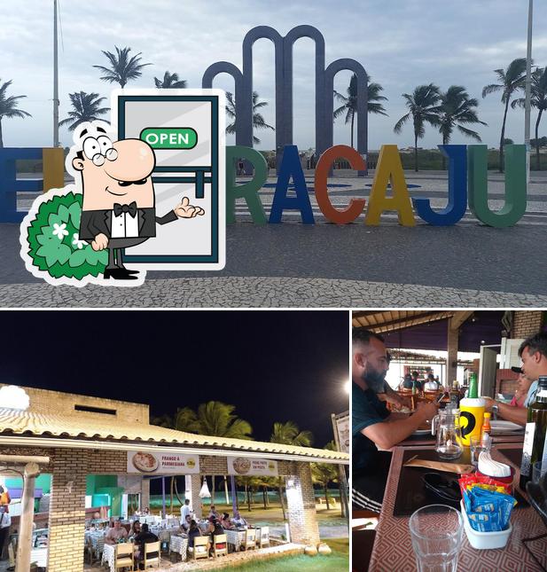 Entre diferentes coisas, exterior e balcão de bar podem ser encontrados no Restaurante Tarrafas