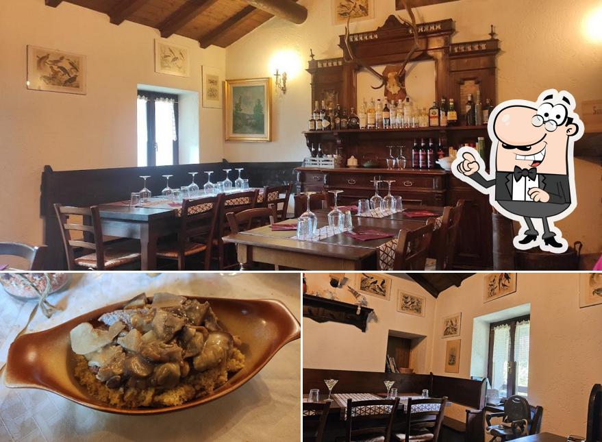 Questa è la foto che mostra la interni e cibo di Ristorante La Ca' Nei Sass