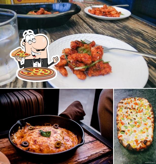 Order pizza at Nirvana Lounge & Restaurant