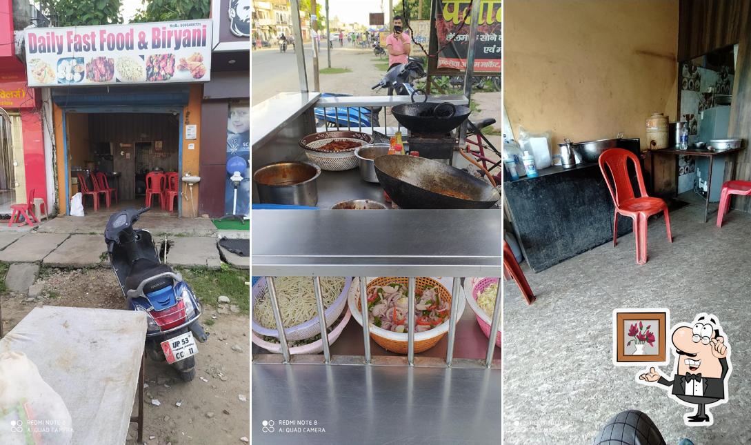 Take a seat at one of the tables at Daily Fast Food & Biryani