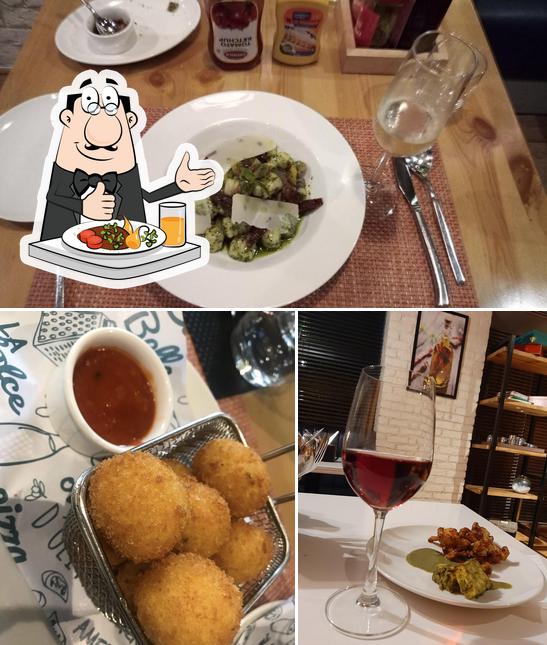 This is the image displaying food and wine at L'Osteria Bella - Aerocity's Top Italian Restaurant & Pizzeria