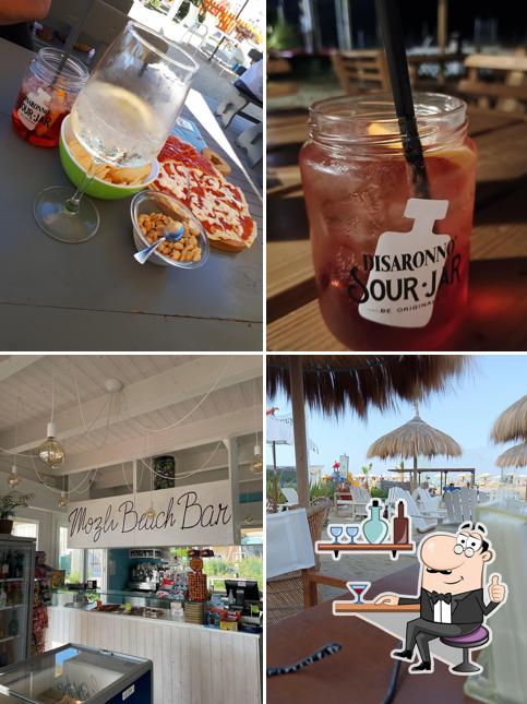 Questa è la immagine che presenta la interni e bevanda di Mozli Beach Bar