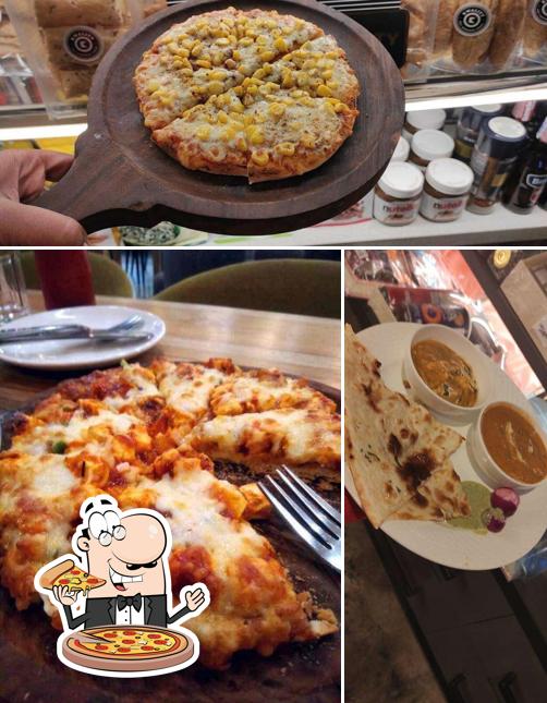Try out pizza at Kwality Cafe & Bakery