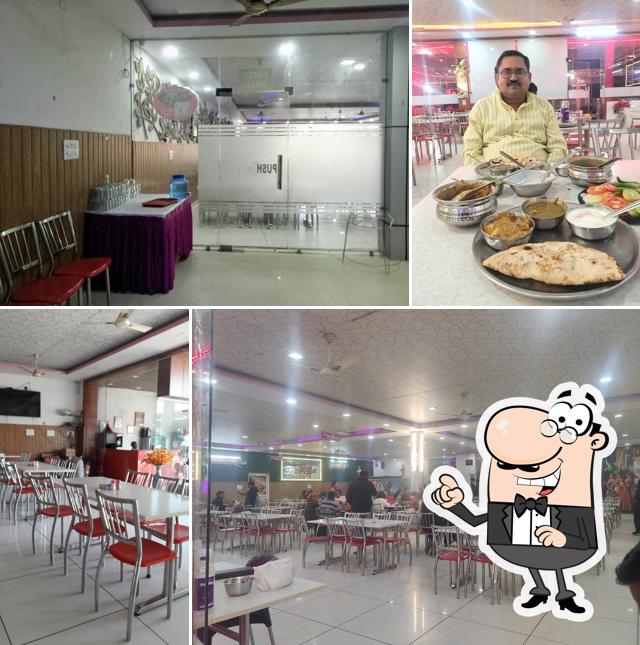 Take a seat at one of the tables at Milan Dhaba