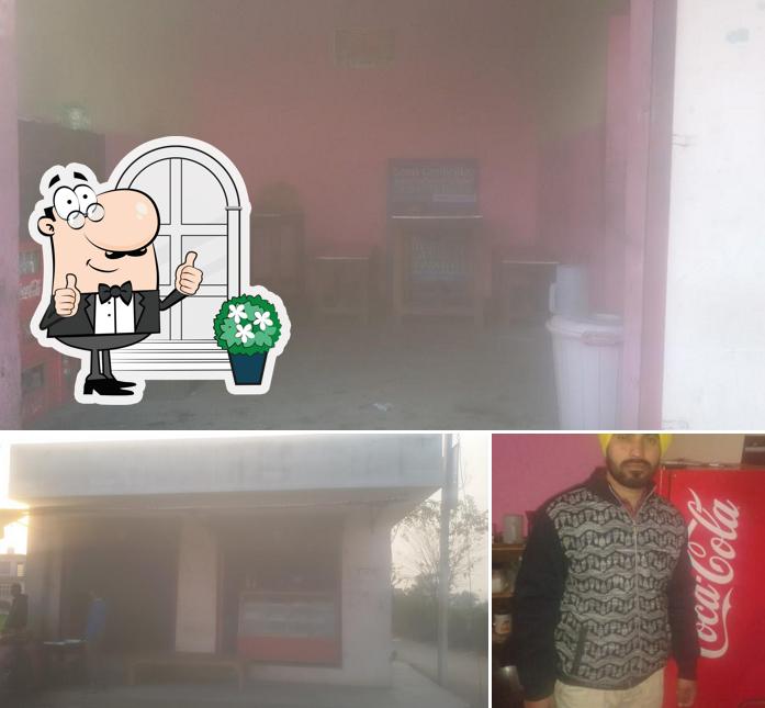 This is the picture depicting exterior and beverage at Minthu Sweet Shop