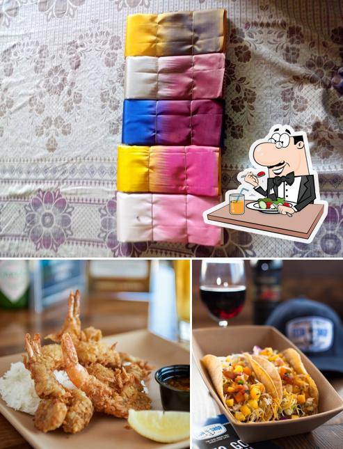 Take a look at the picture depicting food and interior at Fish Shop