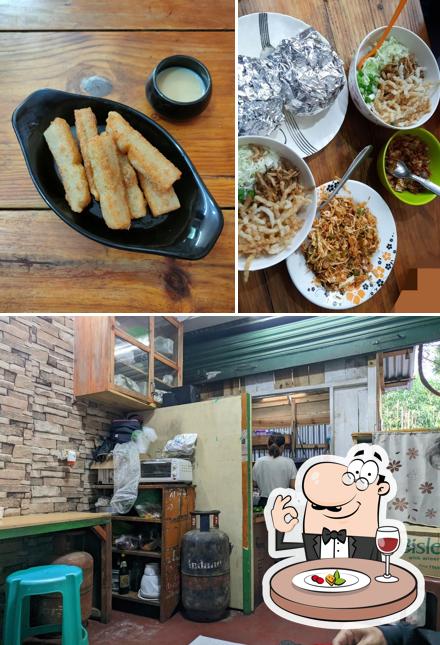 Check out the picture showing food and interior at T 2 Eateries