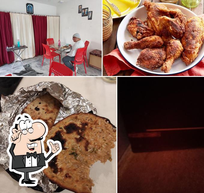 This is the picture showing interior and food at Zayka Chicken Corner