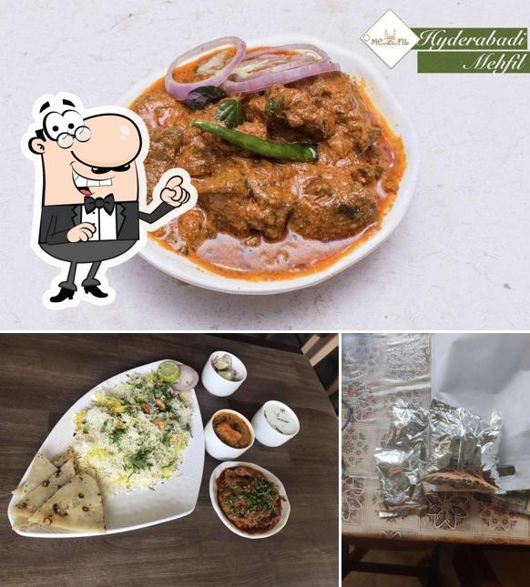 Check out the photo showing interior and food at Hyderabadi Mehfil