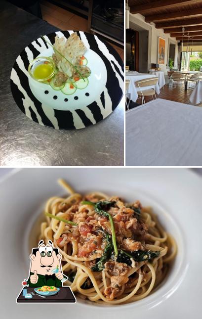 Guarda la immagine che raffigura la cibo e interni di Pizzeria Saporoso
