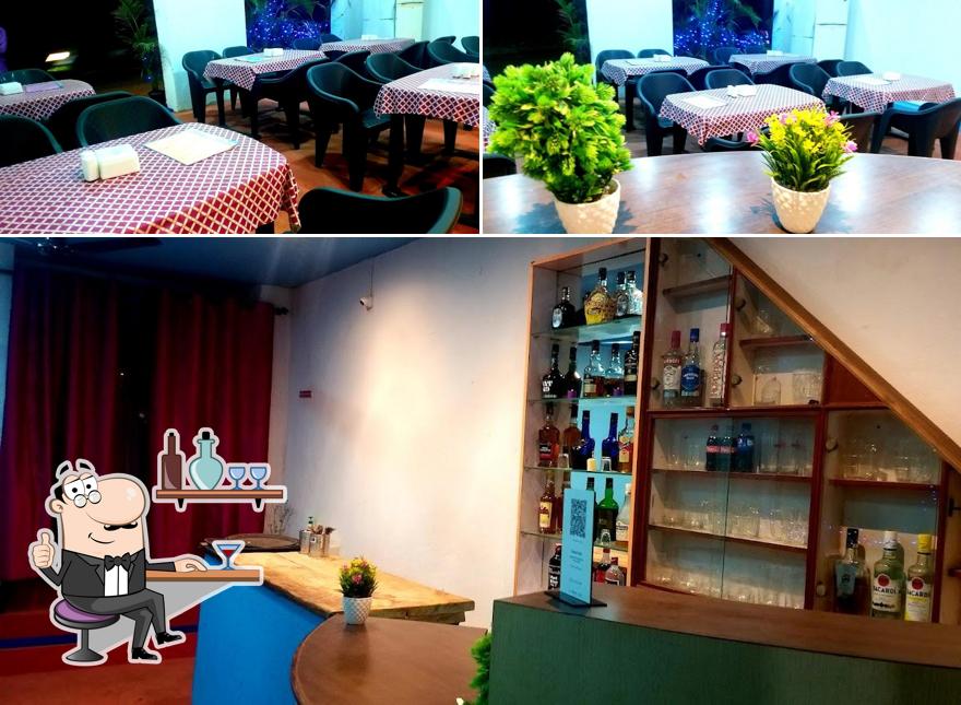 Take a seat at one of the tables at GOAN DARBAR FAMILY RESTAURANT & BAR