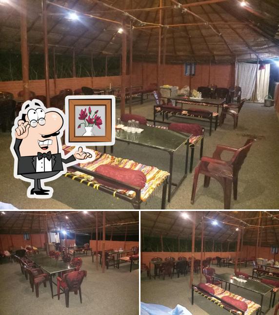 The photo of interior and food at Sandeep Hotel
