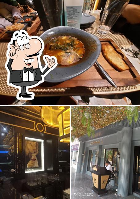 Take a look at the picture depicting interior and food at Kamaa Café