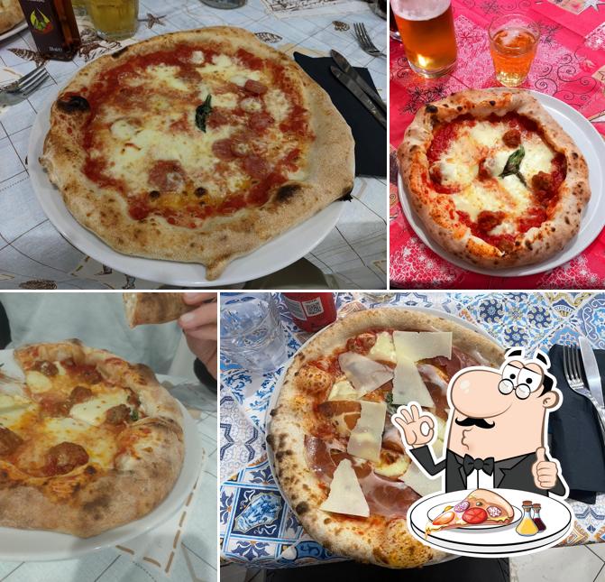 Prova una pizza a Pizzeria Trattoria “Lo Scugnizzo Partenopeo”