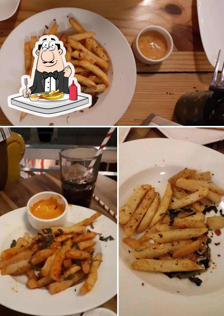 Try out French-fried potatoes at Gilly's Super Bar